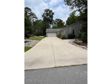 This 3 bedroom 2.5 Bath home located on a Corner Lot is located on Brandywine Bay Golf Club in North Carolina - for sale on GolfHomes.com, golf home, golf lot