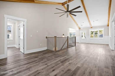 Experience the perfect blend of modern luxury and coastal charm on Brick Landing Plantation Yacht and Golf Club in North Carolina - for sale on GolfHomes.com, golf home, golf lot