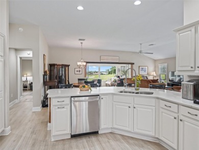 This Custom expanded Gardenia Model has pictuesqes views through on Glenview Championship Golf and Country Club in Florida - for sale on GolfHomes.com, golf home, golf lot