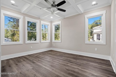 Experience the perfect blend of modern luxury and coastal charm on Brick Landing Plantation Yacht and Golf Club in North Carolina - for sale on GolfHomes.com, golf home, golf lot