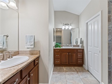 This Custom expanded Gardenia Model has pictuesqes views through on Glenview Championship Golf and Country Club in Florida - for sale on GolfHomes.com, golf home, golf lot