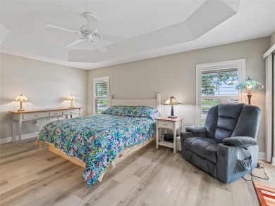 This Custom expanded Gardenia Model has pictuesqes views through on Glenview Championship Golf and Country Club in Florida - for sale on GolfHomes.com, golf home, golf lot