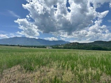 Panoramic Mountain Views in Colorado City - Over an Acre of on Hollydot Golf Course in Colorado - for sale on GolfHomes.com, golf home, golf lot