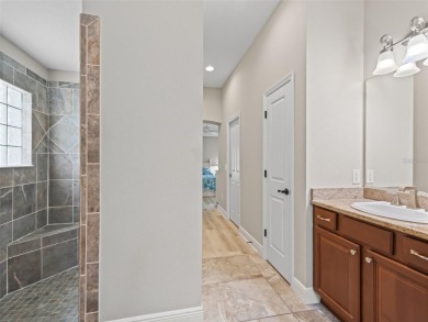 This Custom expanded Gardenia Model has pictuesqes views through on Glenview Championship Golf and Country Club in Florida - for sale on GolfHomes.com, golf home, golf lot