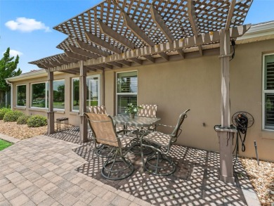 This Custom expanded Gardenia Model has pictuesqes views through on Glenview Championship Golf and Country Club in Florida - for sale on GolfHomes.com, golf home, golf lot