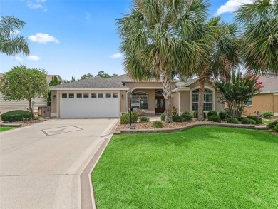 This Custom expanded Gardenia Model has pictuesqes views through on Glenview Championship Golf and Country Club in Florida - for sale on GolfHomes.com, golf home, golf lot