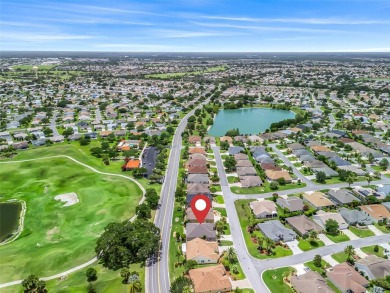 This Custom expanded Gardenia Model has pictuesqes views through on Glenview Championship Golf and Country Club in Florida - for sale on GolfHomes.com, golf home, golf lot