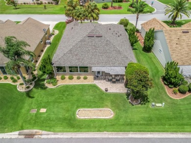 This Custom expanded Gardenia Model has pictuesqes views through on Glenview Championship Golf and Country Club in Florida - for sale on GolfHomes.com, golf home, golf lot