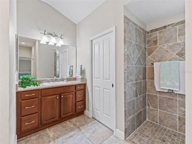 This Custom expanded Gardenia Model has pictuesqes views through on Glenview Championship Golf and Country Club in Florida - for sale on GolfHomes.com, golf home, golf lot