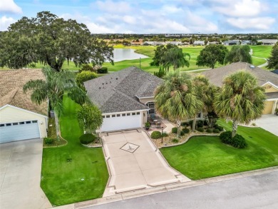 This Custom expanded Gardenia Model has pictuesqes views through on Glenview Championship Golf and Country Club in Florida - for sale on GolfHomes.com, golf home, golf lot