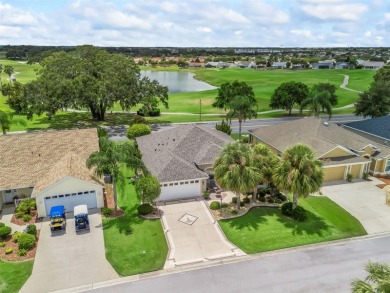 This Custom expanded Gardenia Model has pictuesqes views through on Glenview Championship Golf and Country Club in Florida - for sale on GolfHomes.com, golf home, golf lot