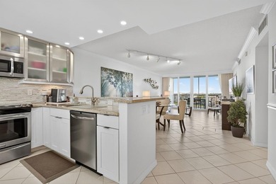 Enjoy breathtaking panoramic LAKE VIEWS & all-day natural light on Palm-Aire Country Club and Resort - Palms in Florida - for sale on GolfHomes.com, golf home, golf lot