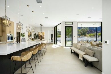 Discover modern elegance and desert beauty at 79242 Tom Fazio on The Quarry at La Quinta in California - for sale on GolfHomes.com, golf home, golf lot