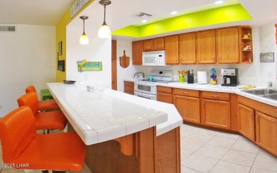 SELLER FINANCING AVAILABLE! Discover this beautifully furnished on London Bridge Golf Course in Arizona - for sale on GolfHomes.com, golf home, golf lot