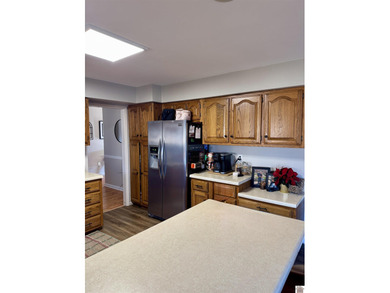 This 3 bedroom/2 full bath home is situated on a shaded on Benton Golf and Country Club in Kentucky - for sale on GolfHomes.com, golf home, golf lot