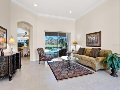 This wonderful 3-bedroom home with SPACIOUS BONUS ROOM, HEATED on Pelican Pointe Golf and Country Club in Florida - for sale on GolfHomes.com, golf home, golf lot