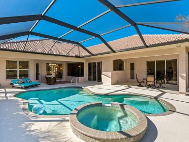 This wonderful 3-bedroom home with SPACIOUS BONUS ROOM, HEATED on Pelican Pointe Golf and Country Club in Florida - for sale on GolfHomes.com, golf home, golf lot