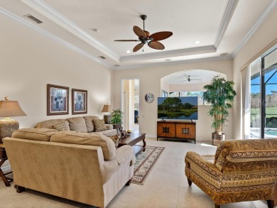 This wonderful 3-bedroom home with SPACIOUS BONUS ROOM, HEATED on Pelican Pointe Golf and Country Club in Florida - for sale on GolfHomes.com, golf home, golf lot