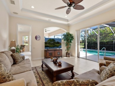 This wonderful 3-bedroom home with SPACIOUS BONUS ROOM, HEATED on Pelican Pointe Golf and Country Club in Florida - for sale on GolfHomes.com, golf home, golf lot