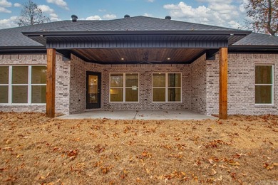 Step inside this beautiful new 4 bed, 2.5 bath home and fall in on Silver Springs Country Club in Arkansas - for sale on GolfHomes.com, golf home, golf lot