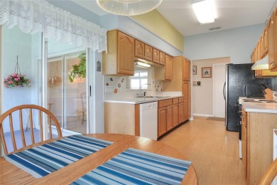 Welcome to this delightful 2-bedroom, 2-bathroom home with a on Sandpiper Golf Club in Florida - for sale on GolfHomes.com, golf home, golf lot