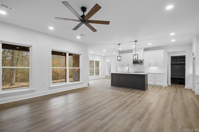 Step inside this beautiful new 4 bed, 2.5 bath home and fall in on Silver Springs Country Club in Arkansas - for sale on GolfHomes.com, golf home, golf lot