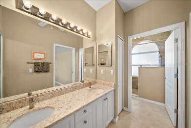 Embrace the ultimate Florida lifestyle at this furnished on Heritage Oaks Golf and Country Club in Florida - for sale on GolfHomes.com, golf home, golf lot