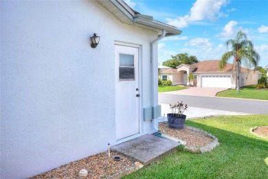 Welcome to this delightful 2-bedroom, 2-bathroom home with a on Sandpiper Golf Club in Florida - for sale on GolfHomes.com, golf home, golf lot