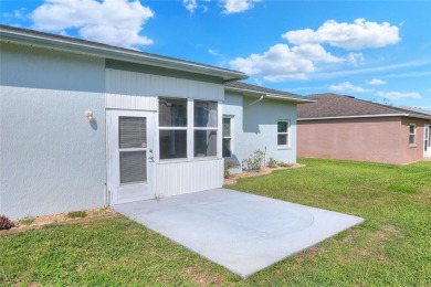 Welcome to this delightful 2-bedroom, 2-bathroom home with a on Sandpiper Golf Club in Florida - for sale on GolfHomes.com, golf home, golf lot