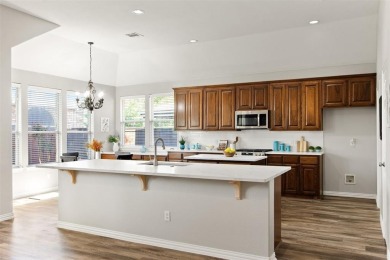 Refined one story residence in prestigious Lantana, showcasing a on Lantana Golf Club in Texas - for sale on GolfHomes.com, golf home, golf lot