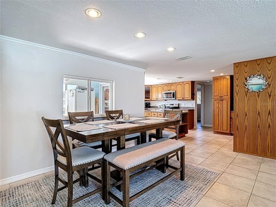 Must see beautiful waterfront pool home in the highly sought on Gulf Harbors Golf Course in Florida - for sale on GolfHomes.com, golf home, golf lot