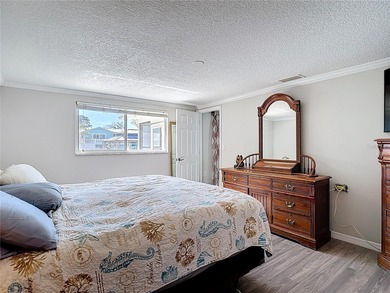 Must see beautiful waterfront pool home in the highly sought on Gulf Harbors Golf Course in Florida - for sale on GolfHomes.com, golf home, golf lot