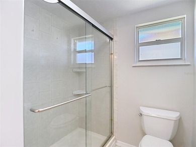 Must see beautiful waterfront pool home in the highly sought on Gulf Harbors Golf Course in Florida - for sale on GolfHomes.com, golf home, golf lot