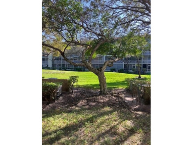 REMODELED, SPACIOUS, 1BR 1.5 BA, CONVENIENTLY LOCATED ON 1ST on Flamingo Lakes Country Club in Florida - for sale on GolfHomes.com, golf home, golf lot