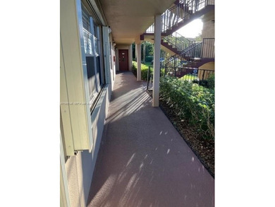 REMODELED, SPACIOUS, 1BR 1.5 BA, CONVENIENTLY LOCATED ON 1ST on Flamingo Lakes Country Club in Florida - for sale on GolfHomes.com, golf home, golf lot