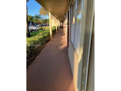 REMODELED, SPACIOUS, 1BR 1.5 BA, CONVENIENTLY LOCATED ON 1ST on Flamingo Lakes Country Club in Florida - for sale on GolfHomes.com, golf home, golf lot