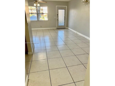 REMODELED, SPACIOUS, 1BR 1.5 BA, CONVENIENTLY LOCATED ON 1ST on Flamingo Lakes Country Club in Florida - for sale on GolfHomes.com, golf home, golf lot