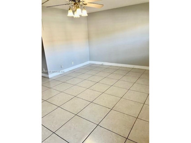 REMODELED, SPACIOUS, 1BR 1.5 BA, CONVENIENTLY LOCATED ON 1ST on Flamingo Lakes Country Club in Florida - for sale on GolfHomes.com, golf home, golf lot