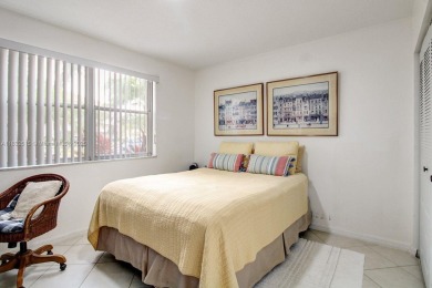 Welcome to this beautifully maintained first-floor corner unit on Sunrise Lakes Phase IV Golf Course in Florida - for sale on GolfHomes.com, golf home, golf lot
