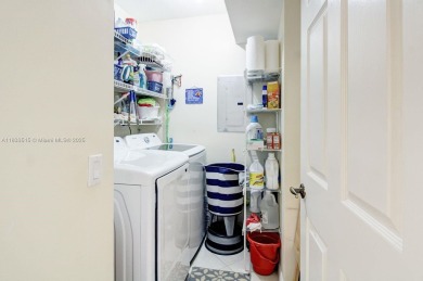 Welcome to this beautifully maintained first-floor corner unit on Sunrise Lakes Phase IV Golf Course in Florida - for sale on GolfHomes.com, golf home, golf lot