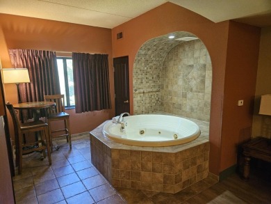 Beautiful 4th floor Condo facing the Wis. River. 2 fireplaces, 3 on Coldwater Canyon Golf Course in Wisconsin - for sale on GolfHomes.com, golf home, golf lot