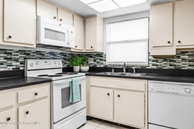 Welcome to this beautifully maintained second-floor condo in the on Mallards Landing Golf Course in Florida - for sale on GolfHomes.com, golf home, golf lot