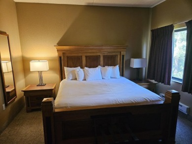 Beautiful 4th floor Condo facing the Wis. River. 2 fireplaces, 3 on Coldwater Canyon Golf Course in Wisconsin - for sale on GolfHomes.com, golf home, golf lot