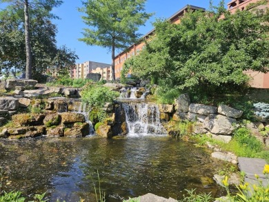 Beautiful 4th floor Condo facing the Wis. River. 2 fireplaces, 3 on Coldwater Canyon Golf Course in Wisconsin - for sale on GolfHomes.com, golf home, golf lot