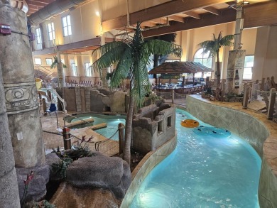 Beautiful 4th floor Condo facing the Wis. River. 2 fireplaces, 3 on Coldwater Canyon Golf Course in Wisconsin - for sale on GolfHomes.com, golf home, golf lot