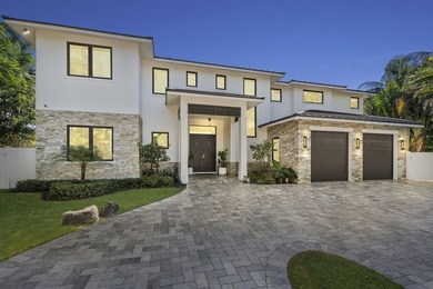 Contemporary Coastal Living in Boca Raton. Stunning Custom Built on Red Reef Executive Golf Course in Florida - for sale on GolfHomes.com, golf home, golf lot