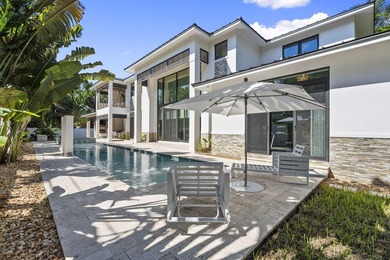 Contemporary Coastal Living in Boca Raton. Stunning Custom Built on Red Reef Executive Golf Course in Florida - for sale on GolfHomes.com, golf home, golf lot