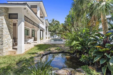 Contemporary Coastal Living in Boca Raton. Stunning Custom Built on Red Reef Executive Golf Course in Florida - for sale on GolfHomes.com, golf home, golf lot