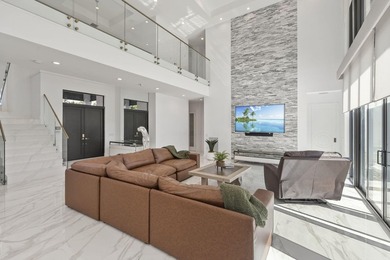 Contemporary Coastal Living in Boca Raton. Stunning Custom Built on Red Reef Executive Golf Course in Florida - for sale on GolfHomes.com, golf home, golf lot