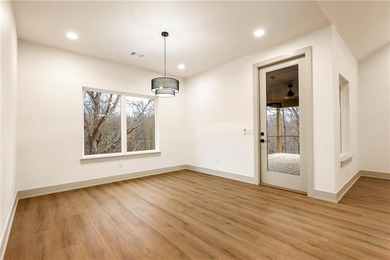 This home is truly a hole-in-one for those seeking a on Bella Vista Country Club - Scottsdale in Arkansas - for sale on GolfHomes.com, golf home, golf lot